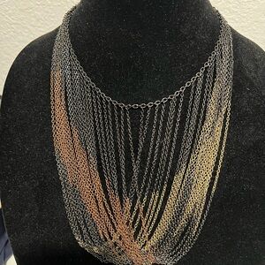 Beautiful tricolor metal adjustable necklace great for all occasions.